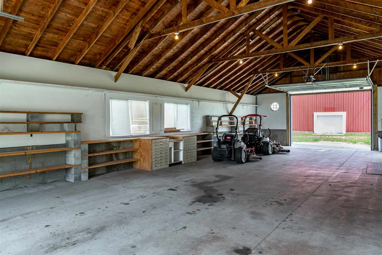 16602 Wyman School Road Caledonia, IL 61011 - Photo 7 of 25 a view of a garage with storage