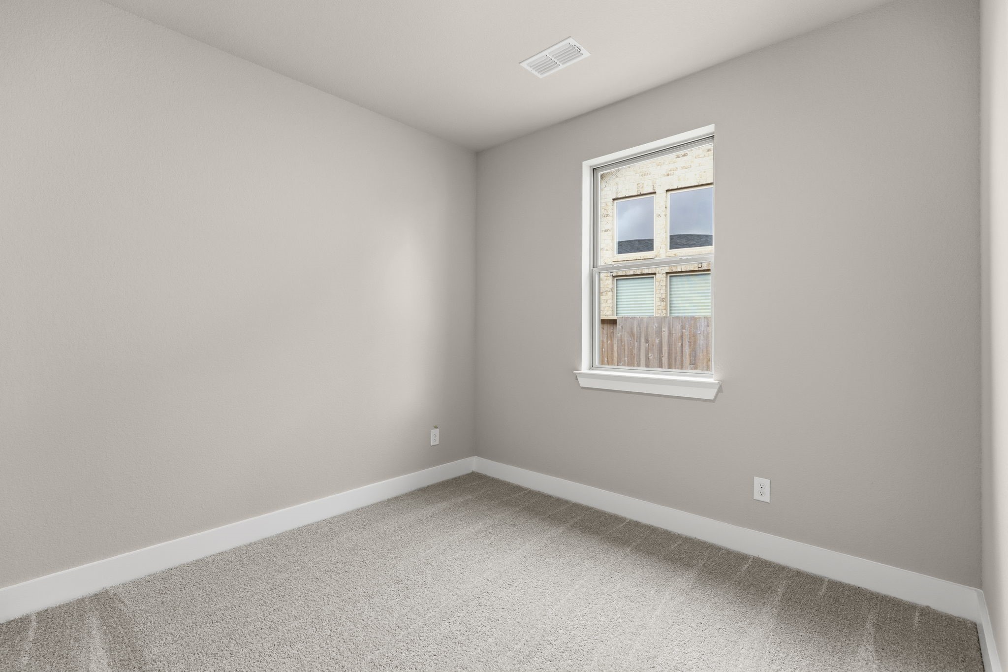 5210 Getty Lane Iowa Colony, TX 77578 - Photo 19 of 34 an empty room with a window