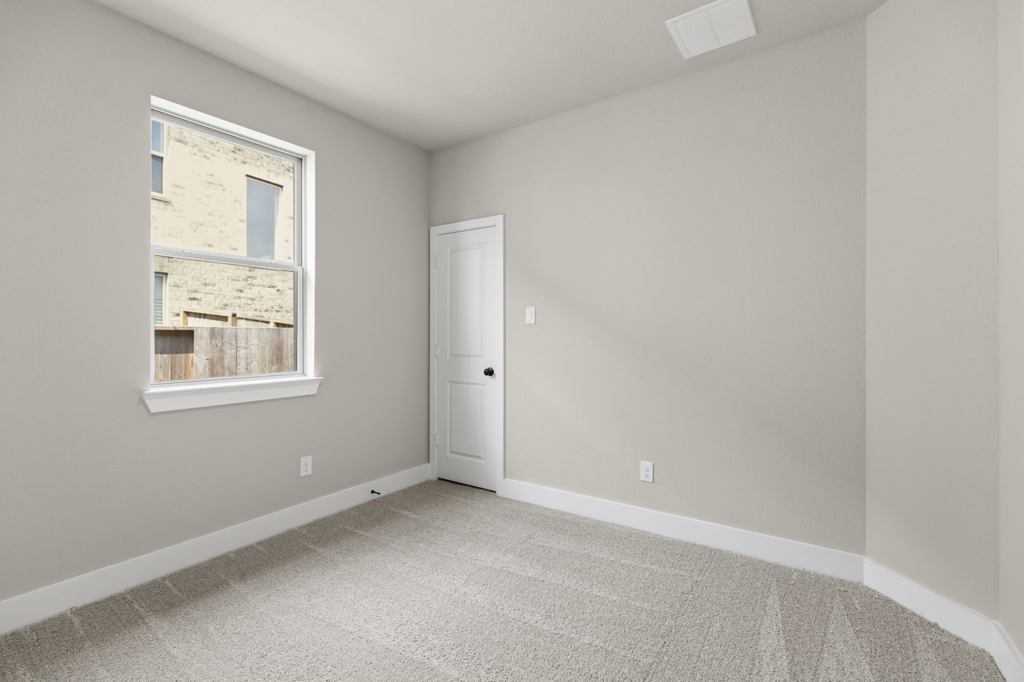 5210 Getty Lane Iowa Colony, TX 77578 - Photo 22 of 34 an empty room with windows