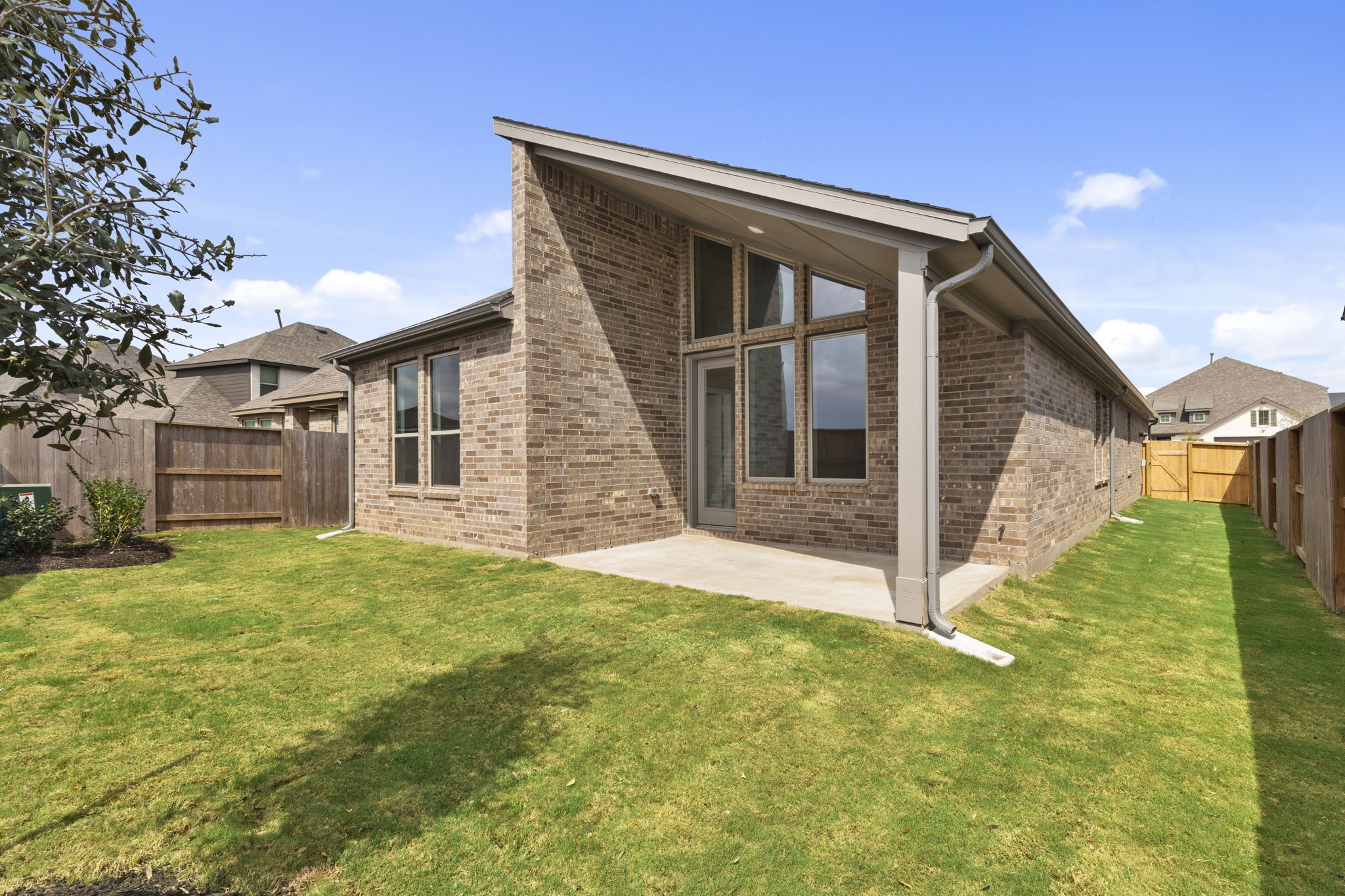 5210 Getty Lane Iowa Colony, TX 77578 - Photo 30 of 34 a view of a house with a yard