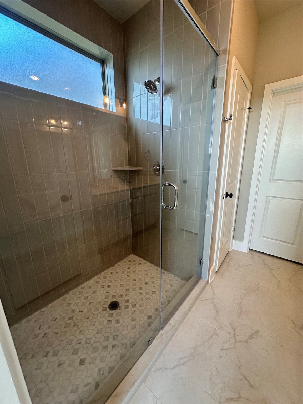 5210 Getty Lane Iowa Colony, TX 77578 - Photo 3 of 30 a bathroom with a shower