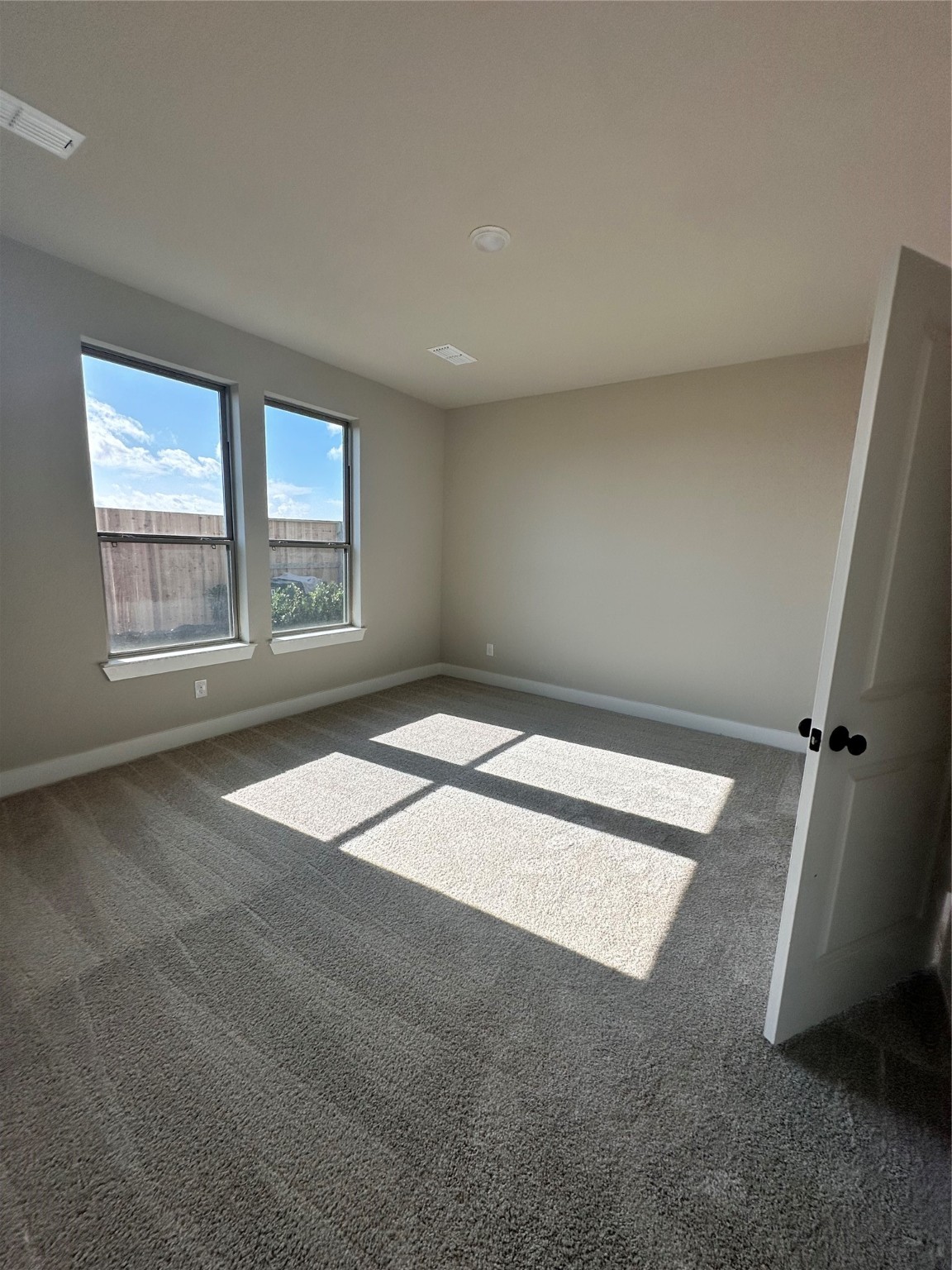 5210 Getty Lane Iowa Colony, TX 77578 - Photo 4 of 30 an empty room with windows