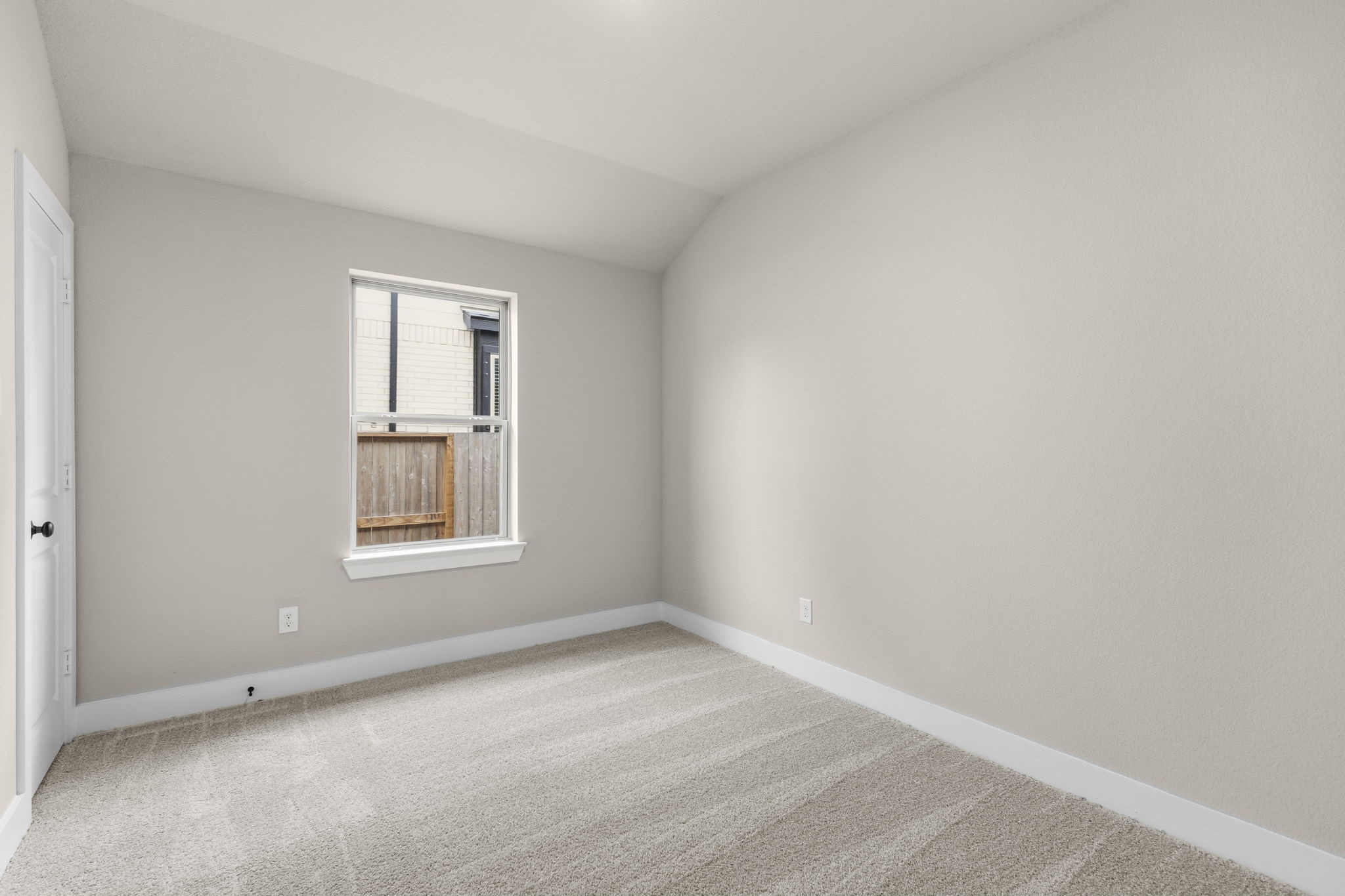 5210 Getty Lane Iowa Colony, TX 77578 - Photo 6 of 34 an empty room with a window