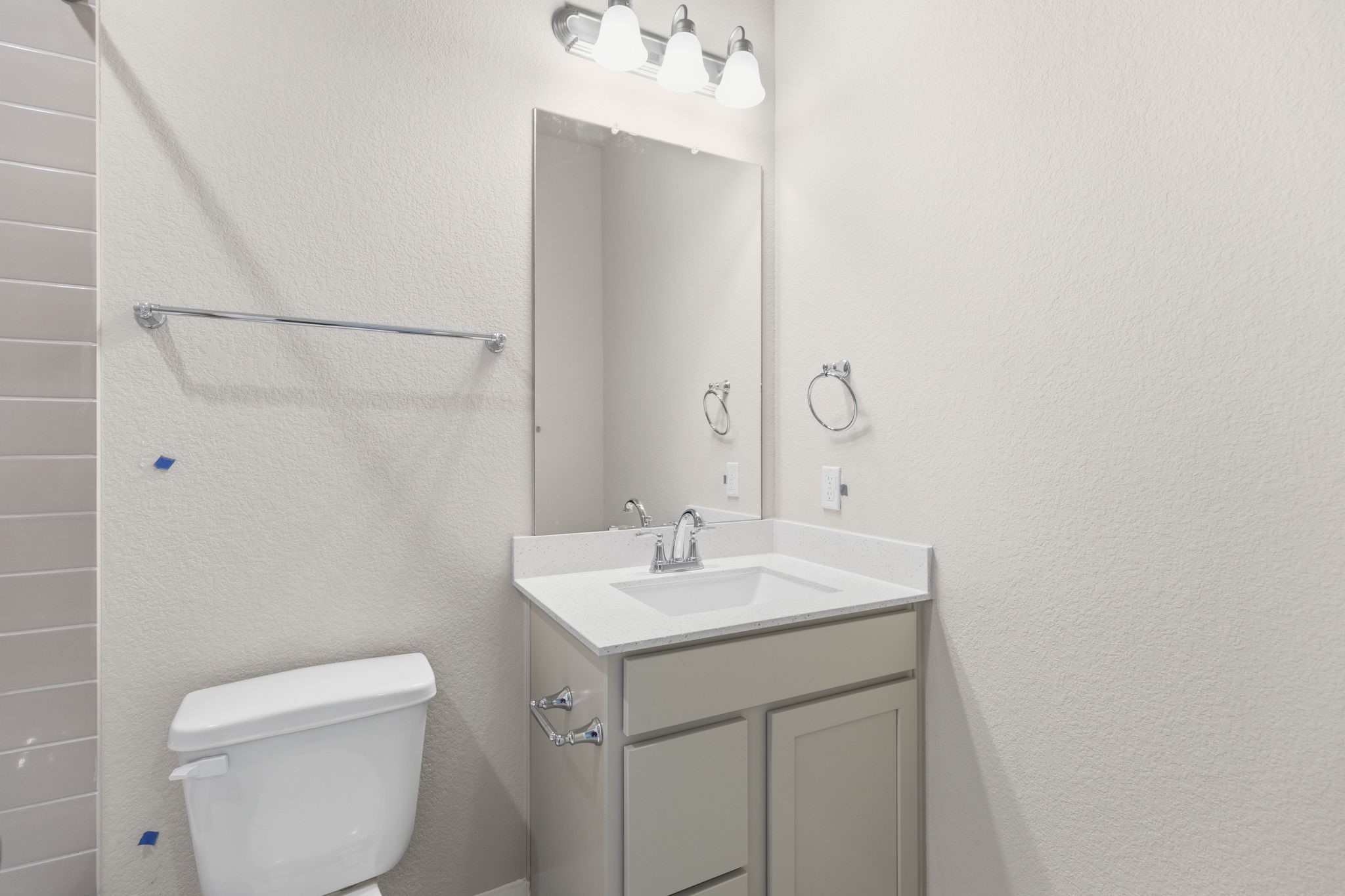 5210 Getty Lane Iowa Colony, TX 77578 - Photo 8 of 34 a bathroom with a sink toilet and mirror