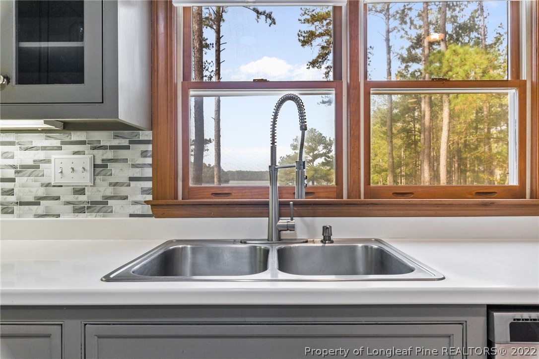 30480 East Lake Road Wagram, NC 28396 - Photo 20 of 49 a view of a sink and a window