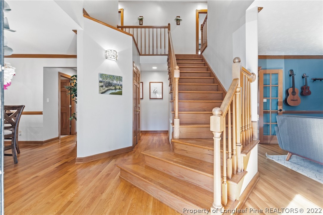 30480 East Lake Road Wagram, NC 28396 - Photo 42 of 49 a view of entryway and hall with wooden floor