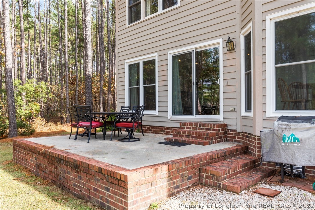 30480 East Lake Road Wagram, NC 28396 - Photo 44 of 49 a view of house with outdoor seating space