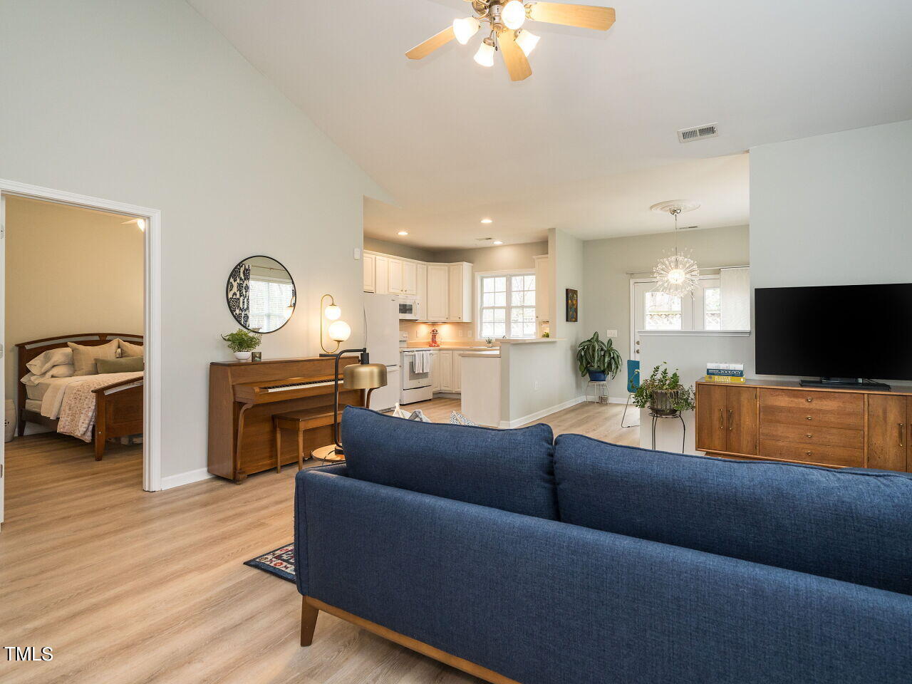 2650 Andover Glen Road Raleigh, NC 27604 - Photo 3 of 27 a living room with furniture and a flat screen tv