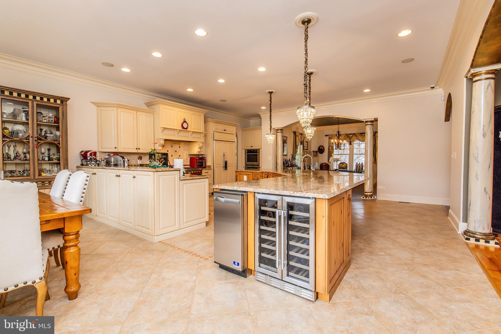 211 Norwood Road Annapolis, MD 21401 - Photo 24 of 94 a kitchen with stainless steel appliances kitchen island granite countertop a stove and a cabinets