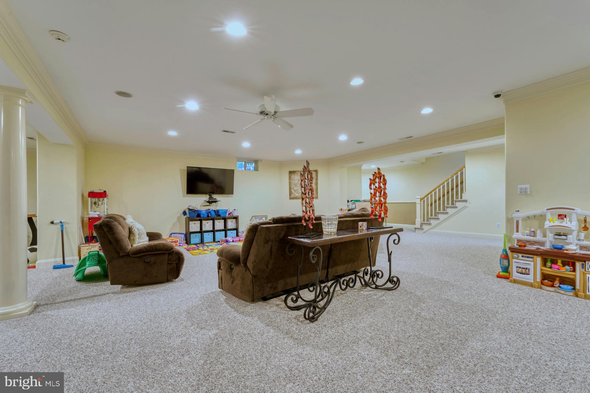 211 Norwood Road Annapolis, MD 21401 - Photo 55 of 94 a living room with furniture and a flat screen tv
