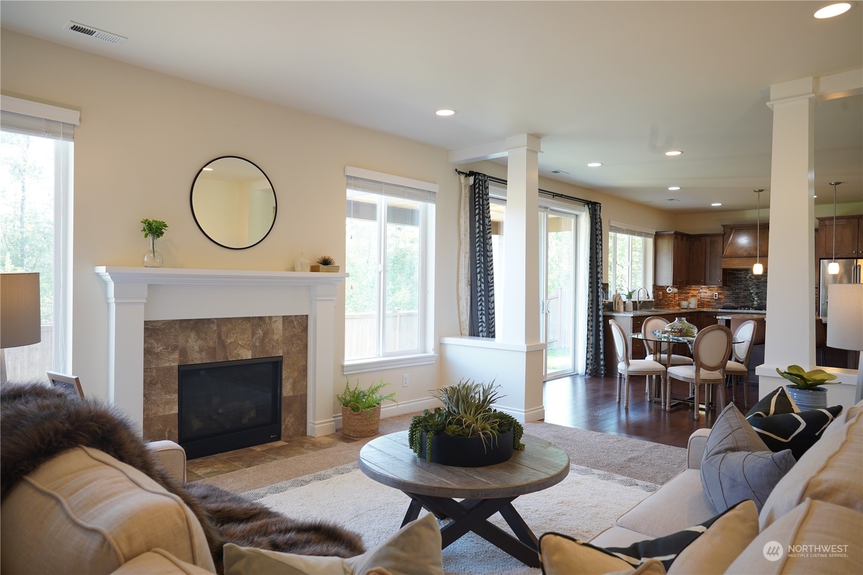 13763 173rd Place Southeast Renton, WA 98059 - Photo 15 of 40 a living room with furniture and a fireplace