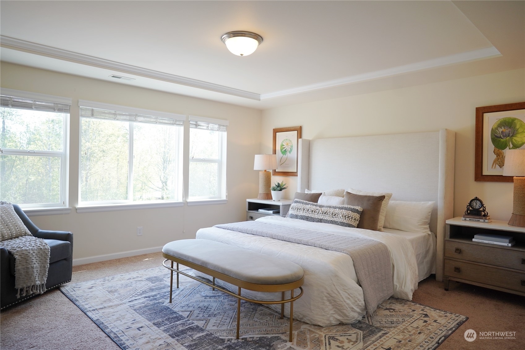 13763 173rd Place Southeast Renton, WA 98059 - Photo 24 of 40 a bedroom with a bed and a couch