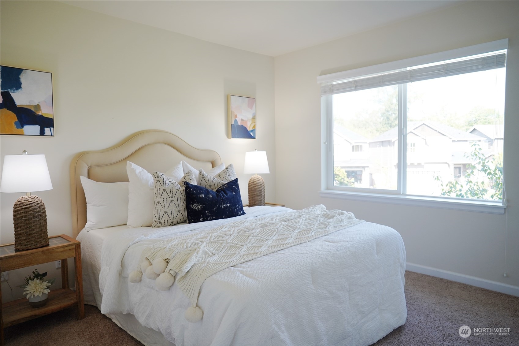 13763 173rd Place Southeast Renton, WA 98059 - Photo 28 of 40 a large bed sitting in a bedroom next to a window