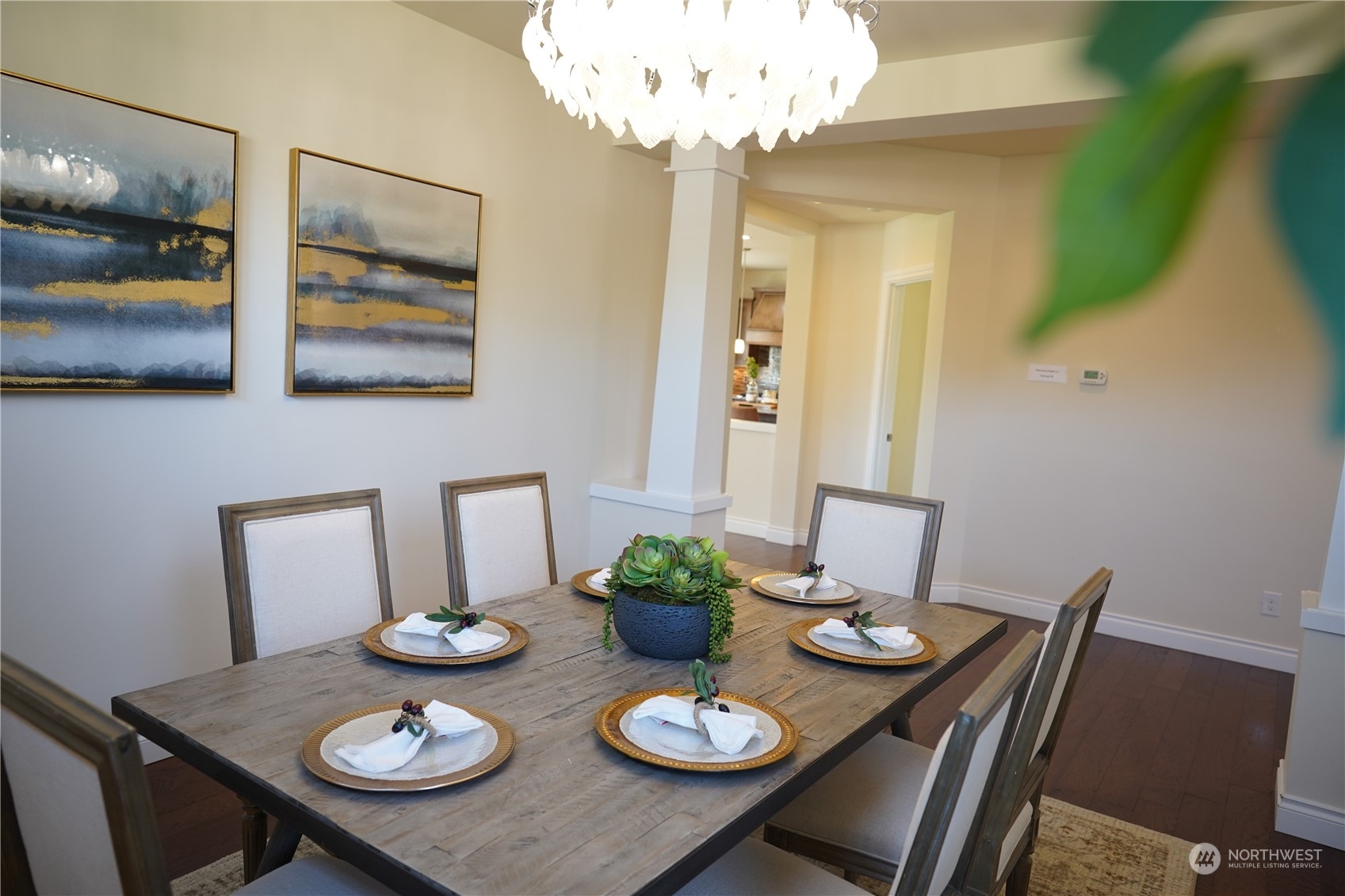 13763 173rd Place Southeast Renton, WA 98059 - Photo 9 of 40 a view of a dining room with furniture and wooden floor