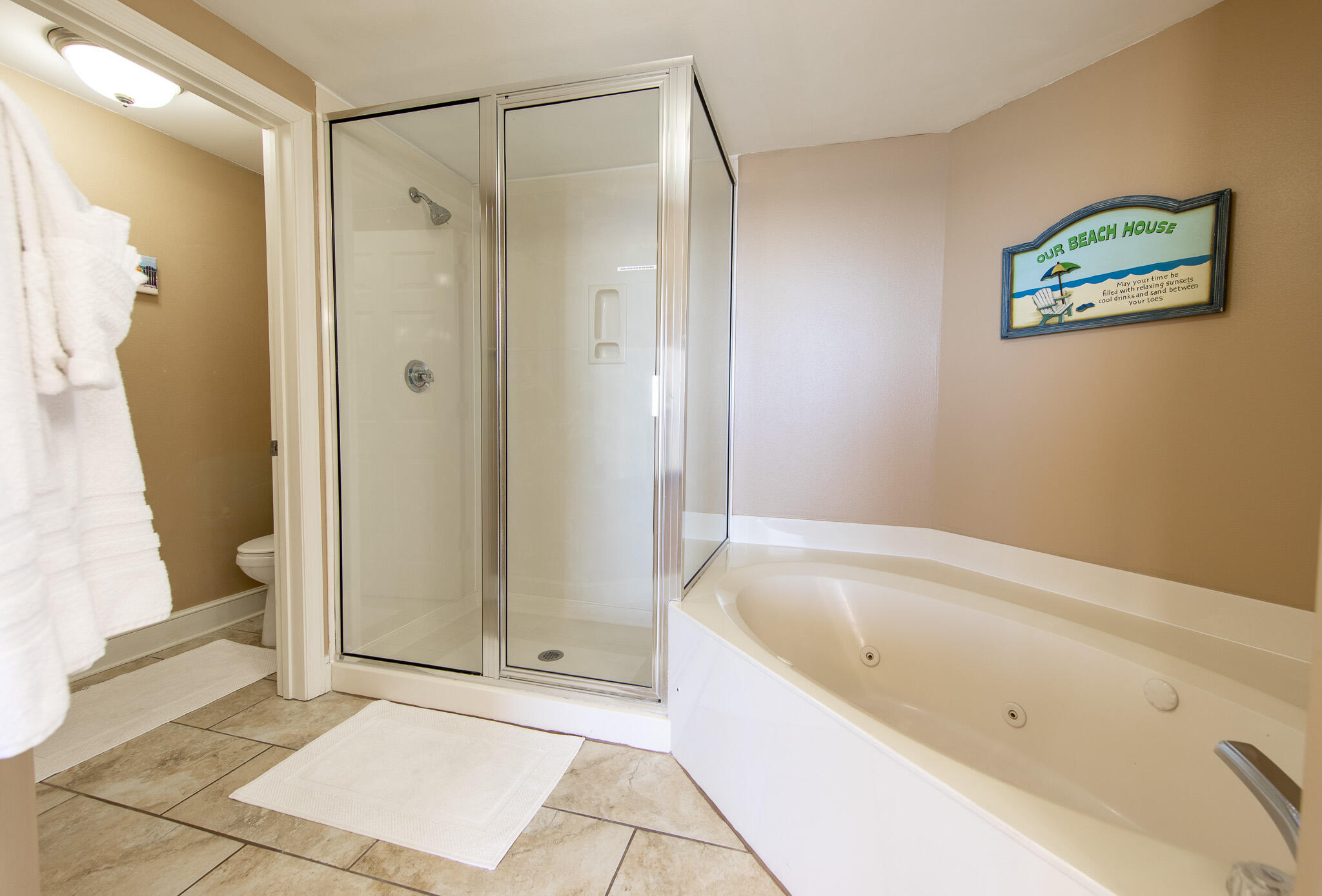 10901 Front Beach Road, Unit 2103 Panama City Beach, FL 32408 - Photo 23 of 54 a bathroom with a bathtub and a shower