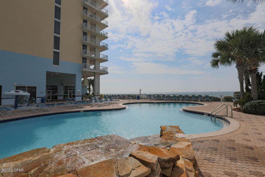 10901 Front Beach Road, Unit 2103 Panama City Beach, FL 32408 - Photo 37 of 54 a view of a swimming pool with outdoor seating
