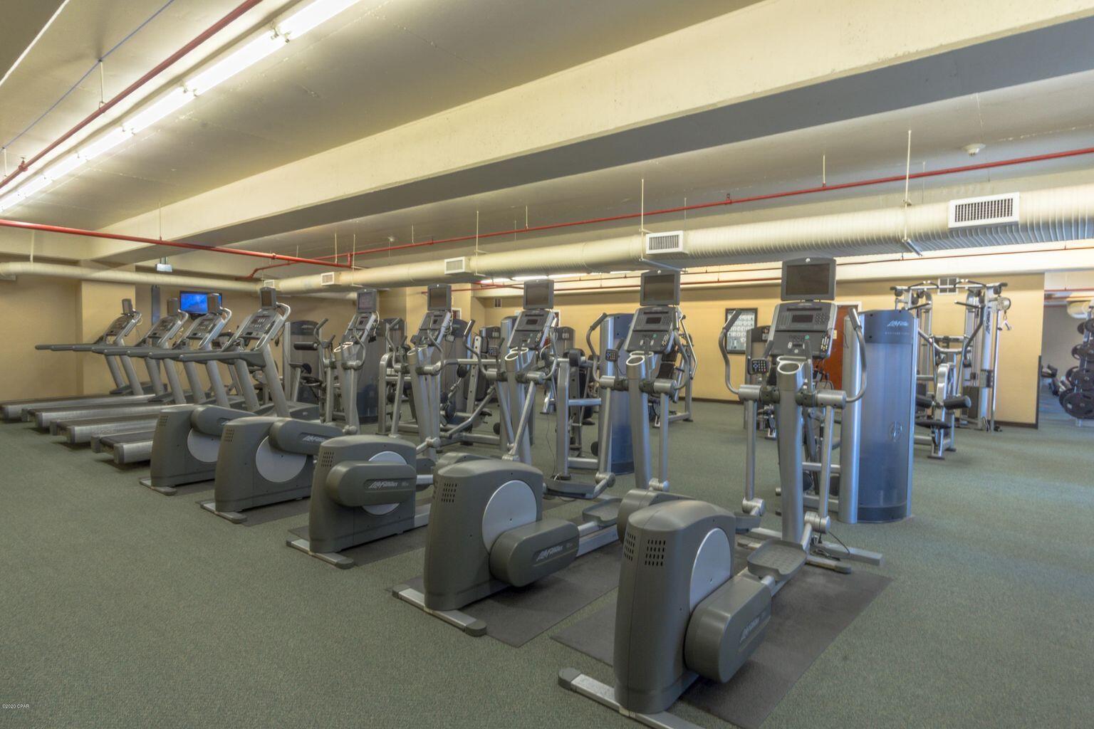 10901 Front Beach Road, Unit 2103 Panama City Beach, FL 32408 - Photo 43 of 54 a view of a room with gym equipment