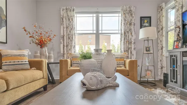 a spacious bathroom with a double vanity sink a toilet and a shower