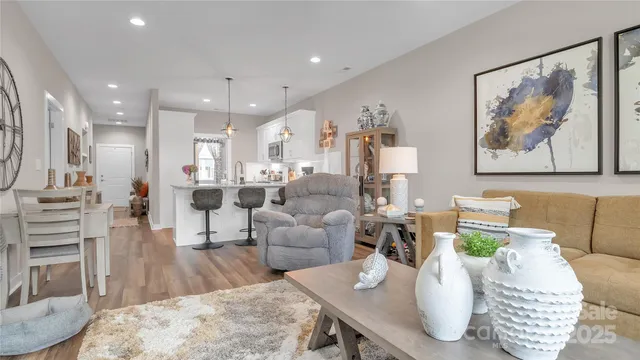 a bathroom with a double vanity sink toilet and shower