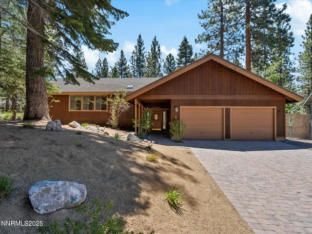 a house with trees in the background