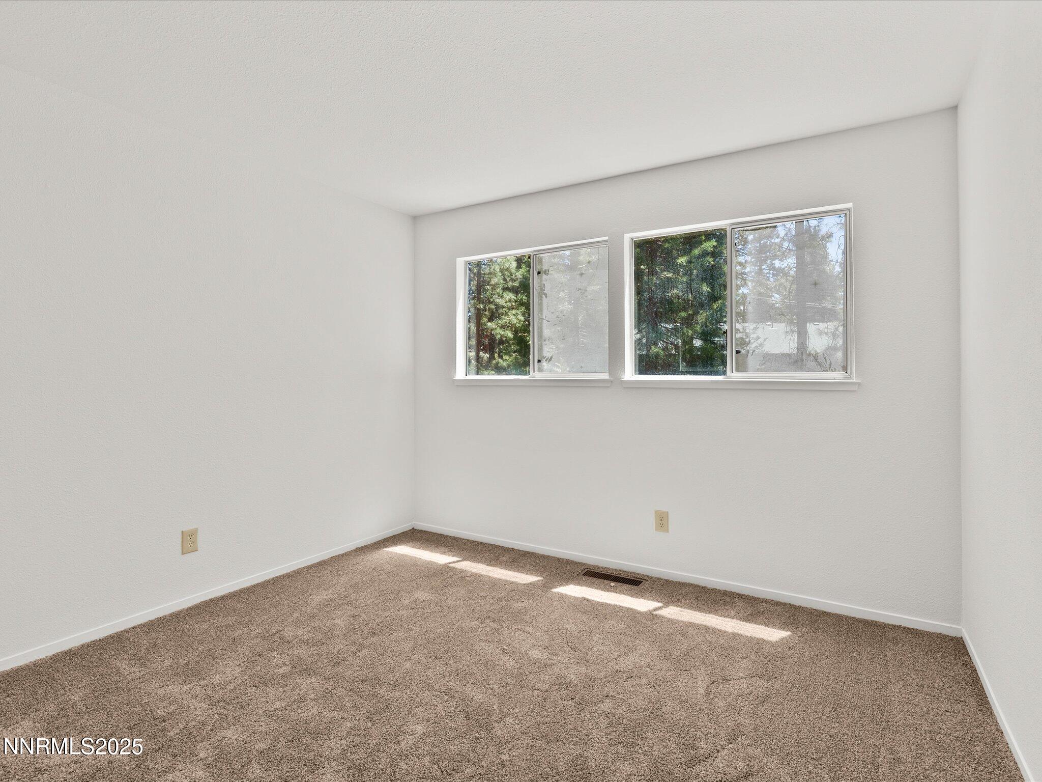 5 Ute Court Stateline, NV 89449 - Photo 25 of 59 an empty room with a window
