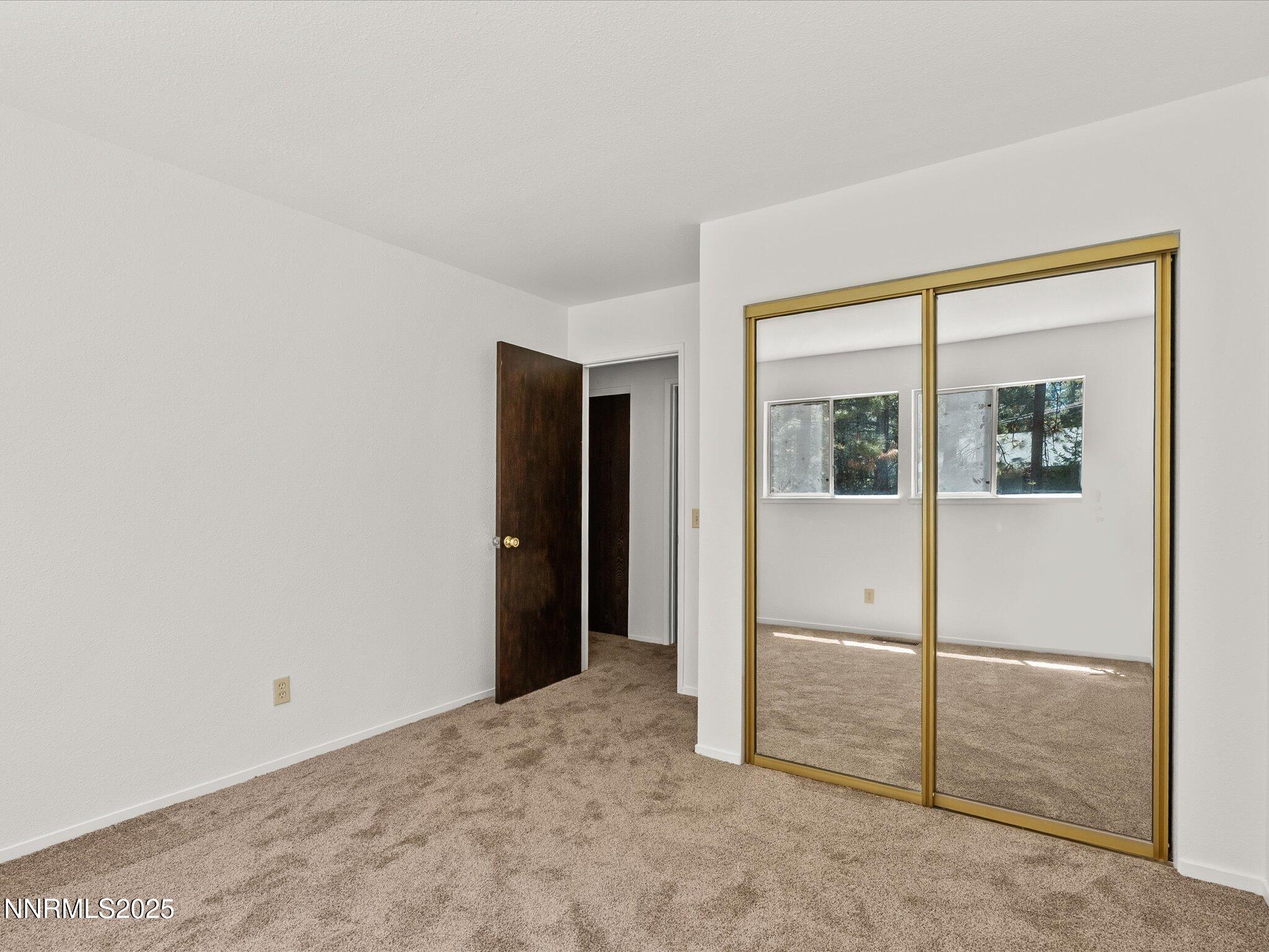 5 Ute Court Stateline, NV 89449 - Photo 29 of 59 an empty room with windows