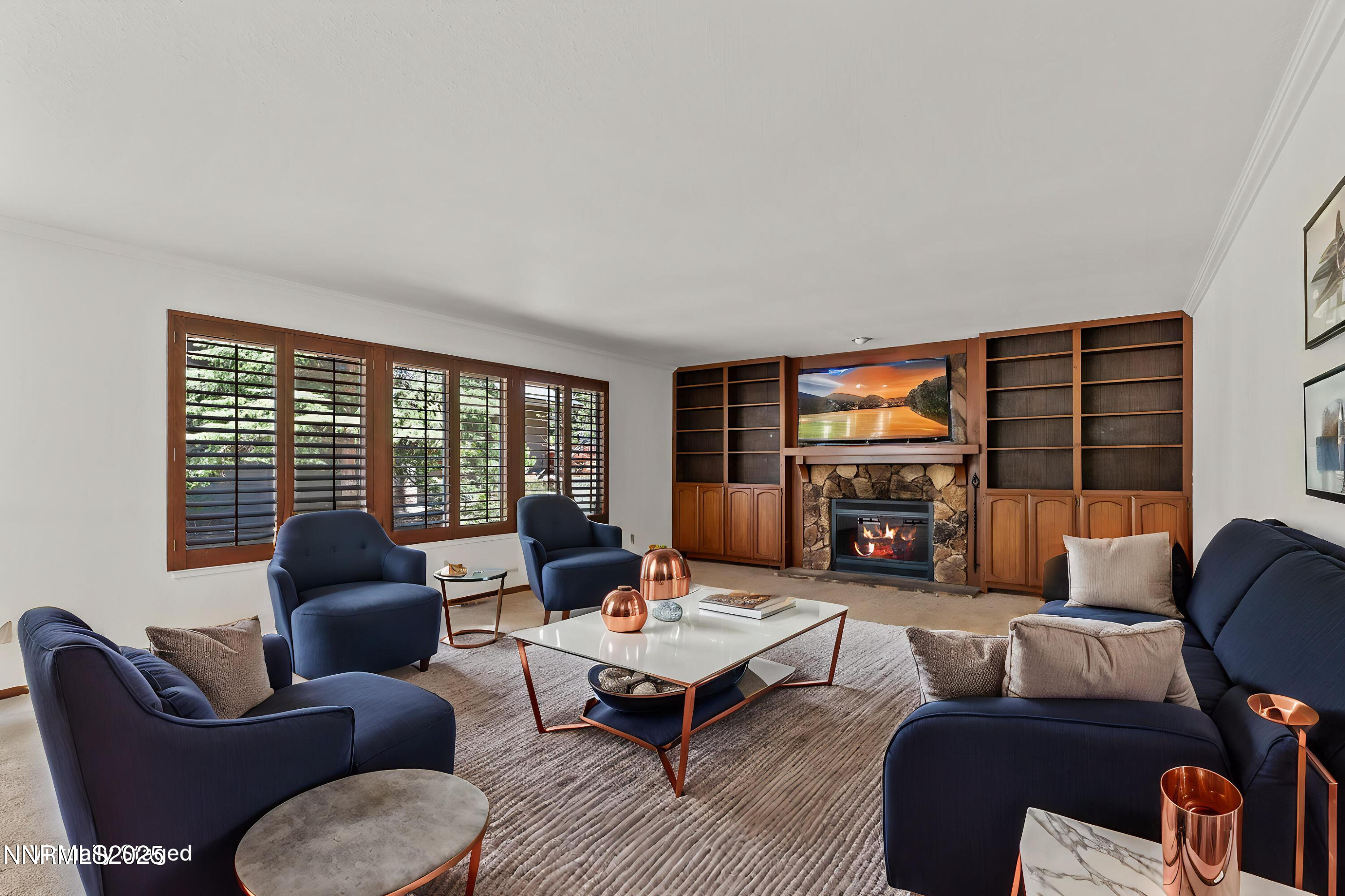 5 Ute Court Stateline, NV 89449 - Photo 3 of 59 a living room with furniture and a large window