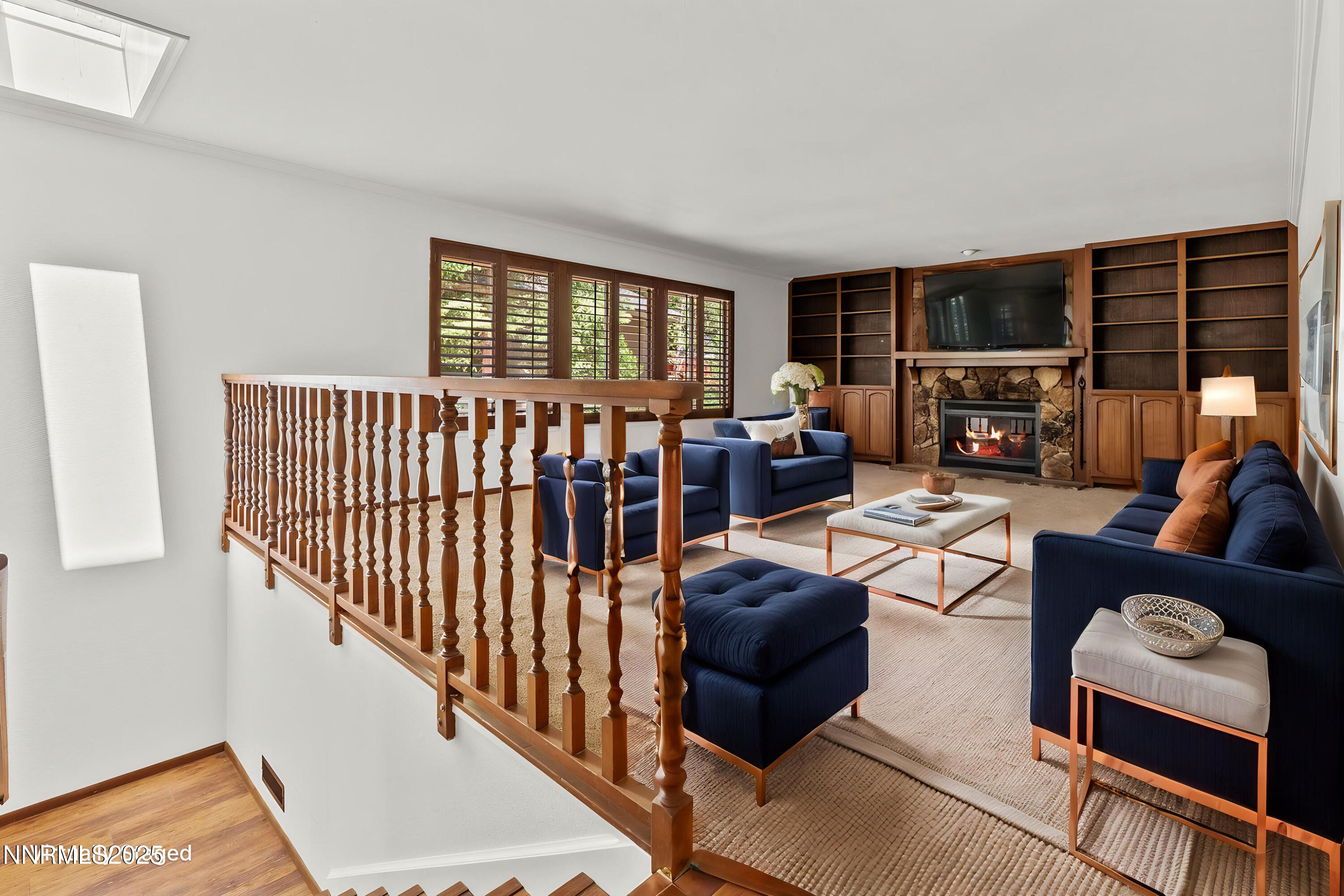5 Ute Court Stateline, NV 89449 - Photo 6 of 59 a living room with furniture fireplace and a flat screen tv
