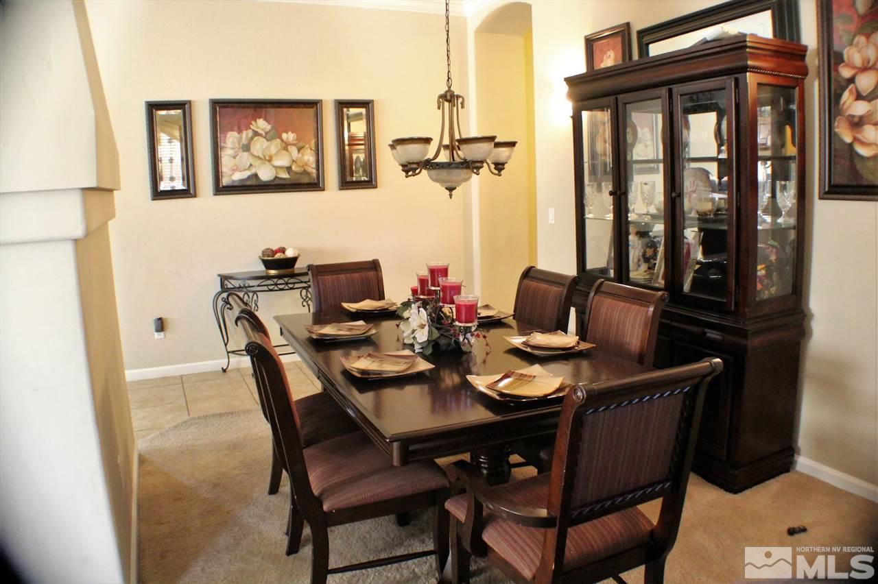 10558 Crystal Bay Drive Reno, NV 89521 - Photo 7 of 16 a view of a dining room with furniture and window