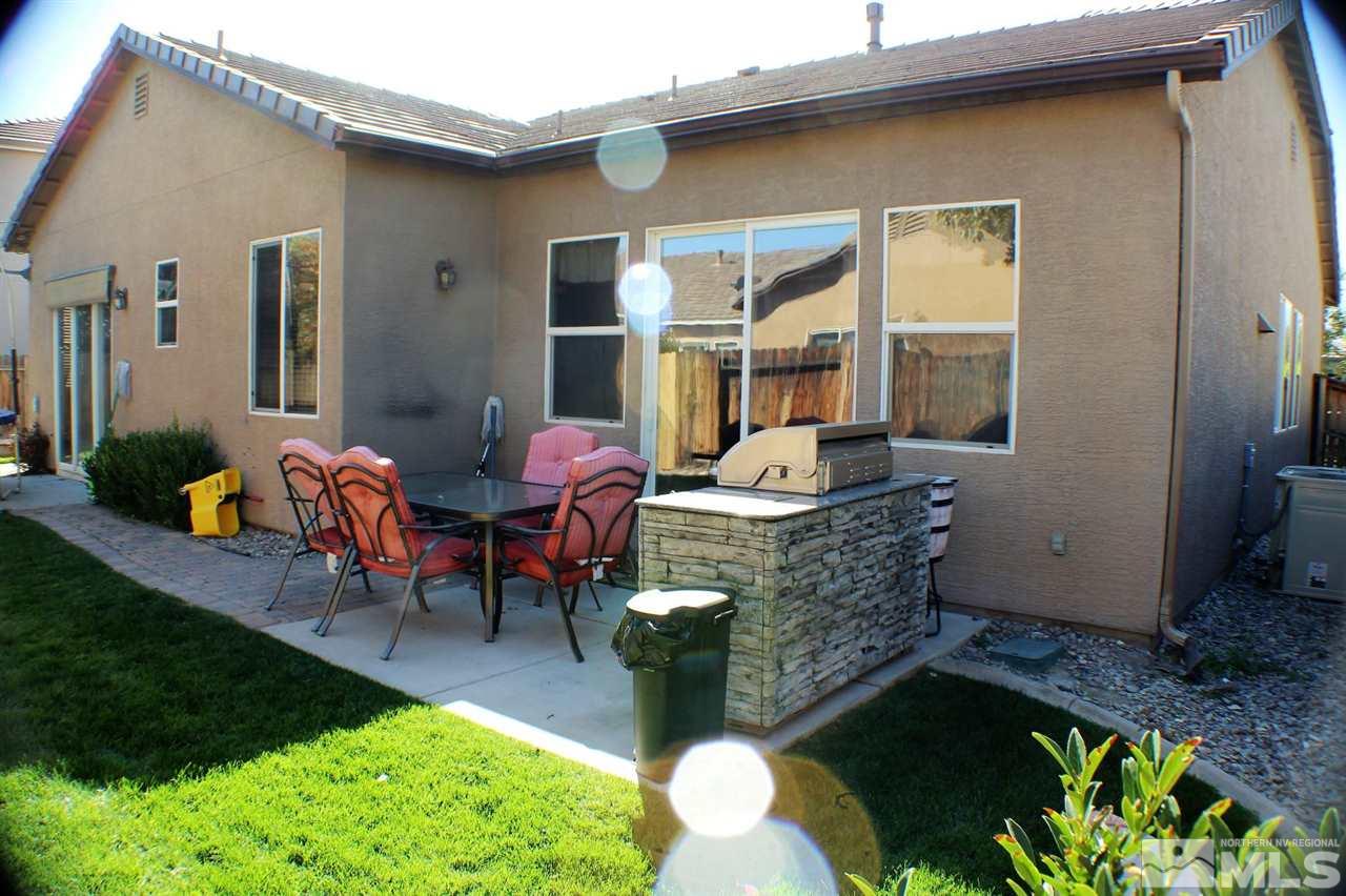 10558 Crystal Bay Drive Reno, NV 89521 - Photo 9 of 16 a front view of a house with patio