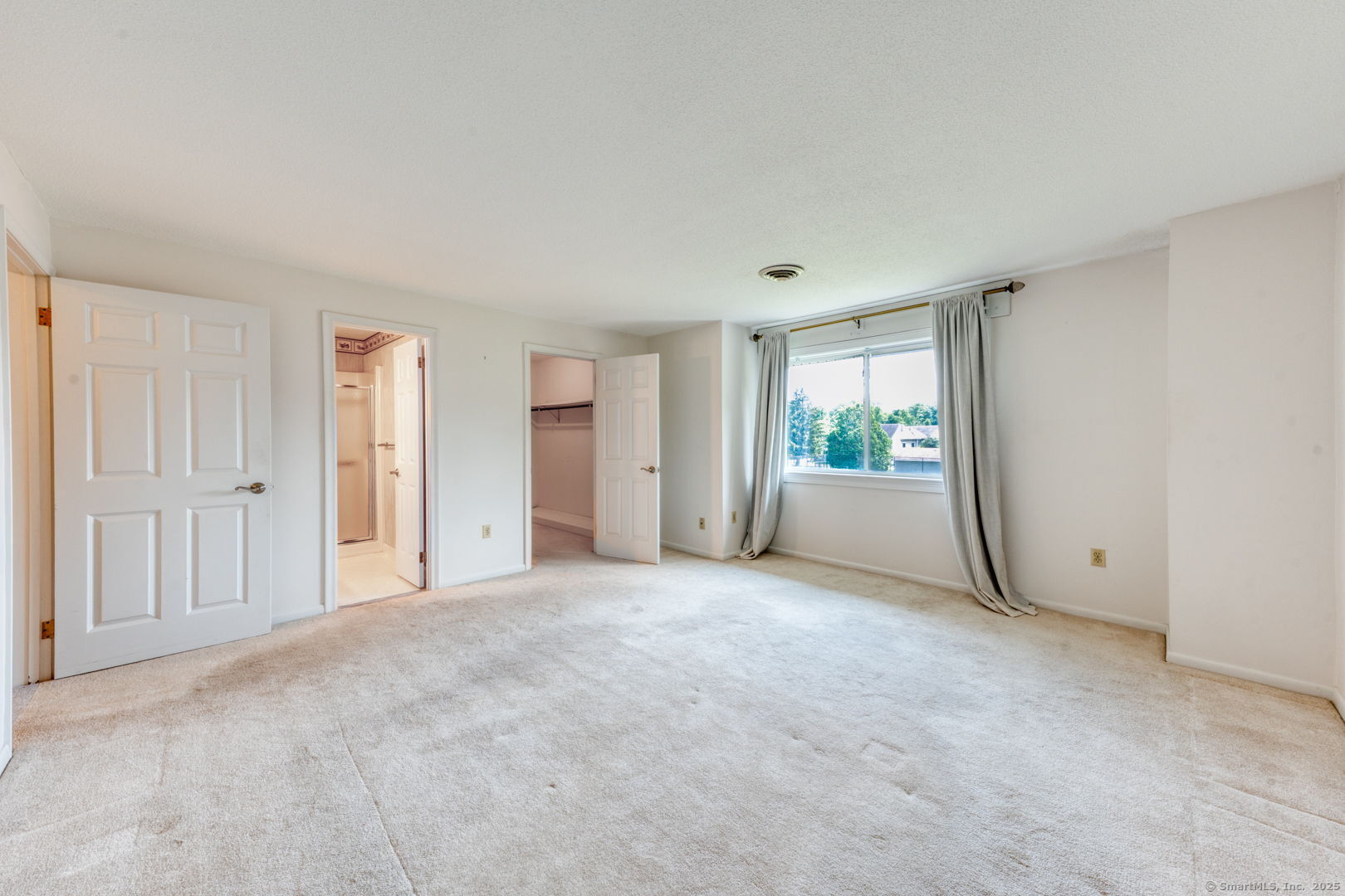 592 Mountain Road, Unit A West Hartford, CT 06117 - Photo 27 of 40 a view of an empty room with a window