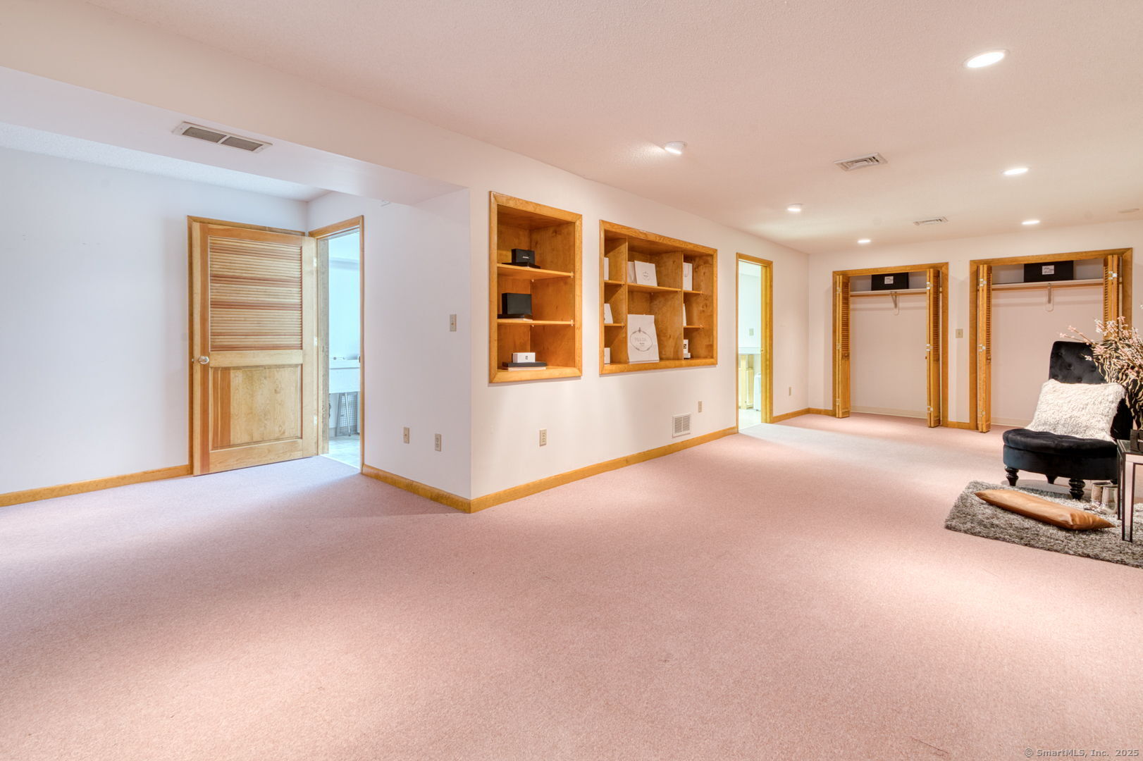 592 Mountain Road, Unit A West Hartford, CT 06117 - Photo 35 of 40 a view of an empty room with a window and kitchen view