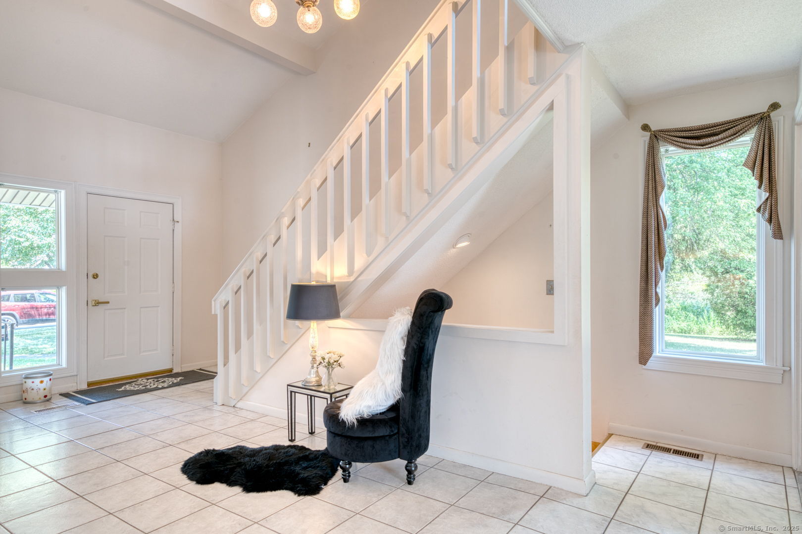 592 Mountain Road, Unit A West Hartford, CT 06117 - Photo 8 of 40 a view of entryway and hall with a window