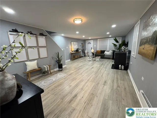 a view of a living room and dining room