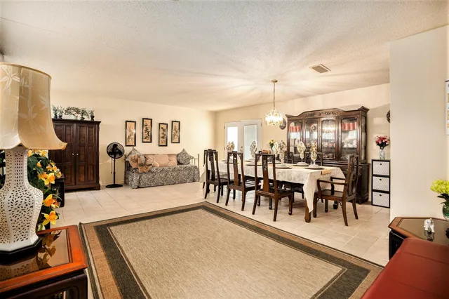a view of a dining room with furniture