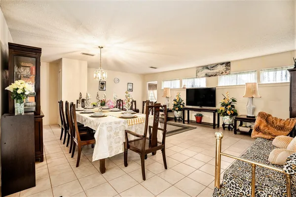 a view of a dining room with furniture
