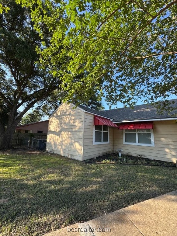 1101 East 30th Street Bryan, TX 77802 - Photo 1 of 42 front view of a house with a yard