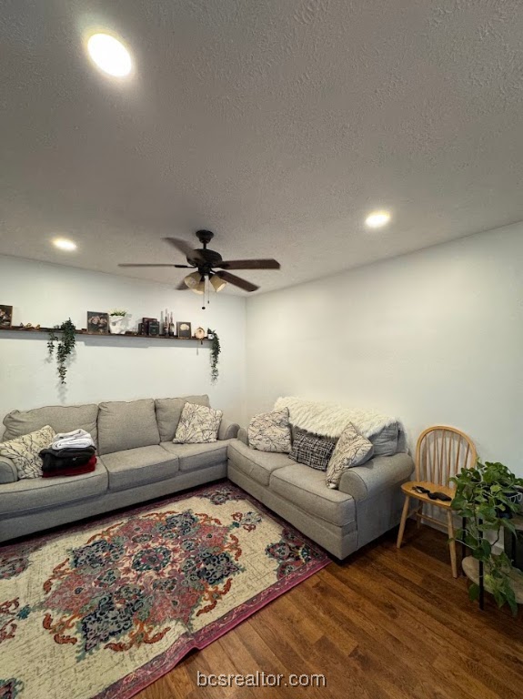 1101 East 30th Street Bryan, TX 77802 - Photo 19 of 42 a living room with furniture and a rug