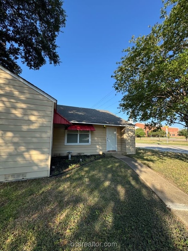 1101 East 30th Street Bryan, TX 77802 - Photo 2 of 42 a view of a house with a yard