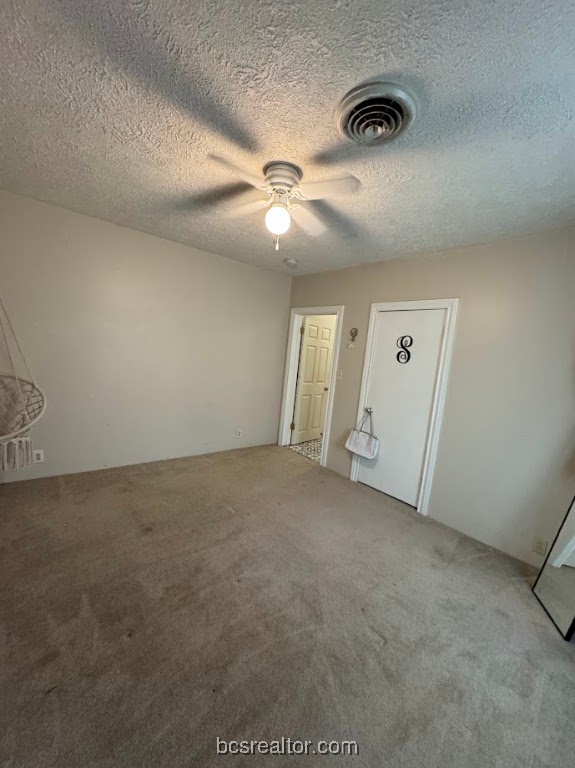 1101 East 30th Street Bryan, TX 77802 - Photo 21 of 42 an empty room with windows and fan