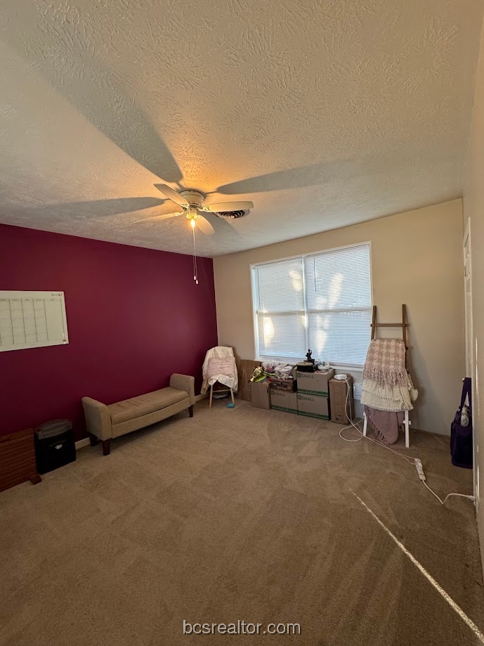 1101 East 30th Street Bryan, TX 77802 - Photo 35 of 42 a view of a room with gym equipment and windows