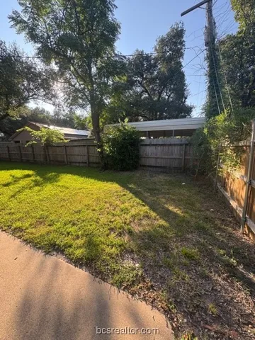 a view of a swimming pool with an outdoor space and seating area