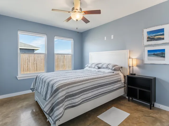 a view of a hallway with windows