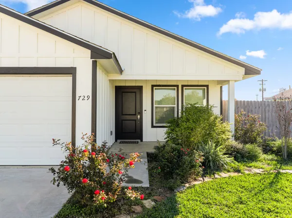 a view of a city with lawn chairs