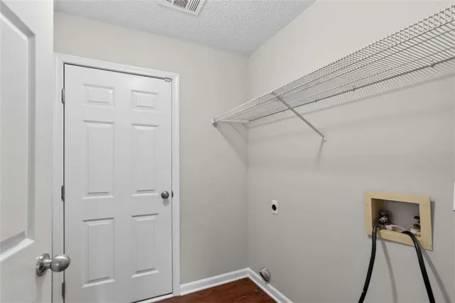 a view of a hallway with closet