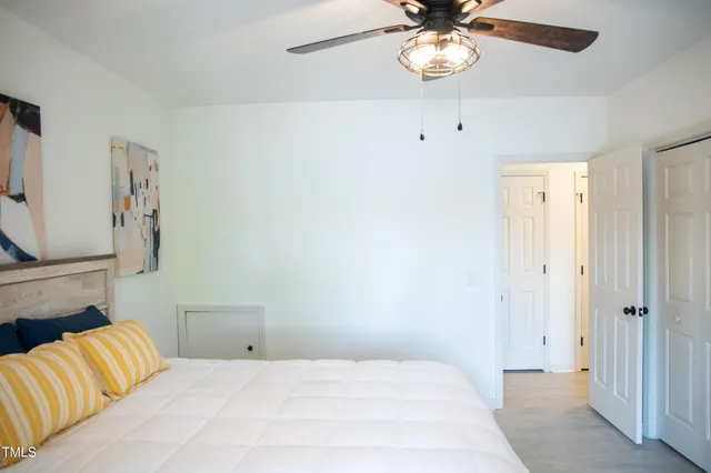 a view of a chairs and table in the patio