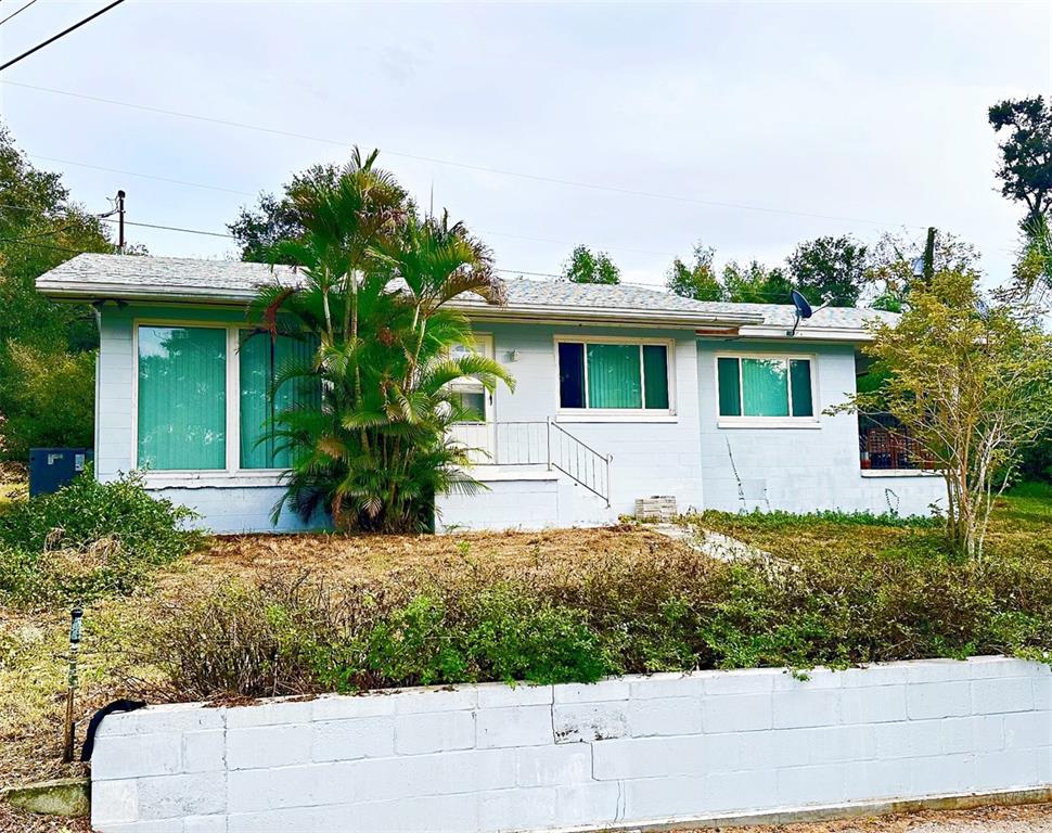 1013 Cody Villa Loop Road Babson Park, FL 33827 - Photo 1 of 6 a front view of a house with garden