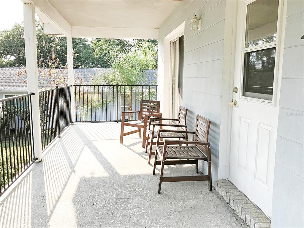 1013 Cody Villa Loop Road Babson Park, FL 33827 - Photo 5 of 6 a view of a balcony with chairs