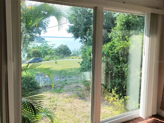 a view of swimming pool from a window