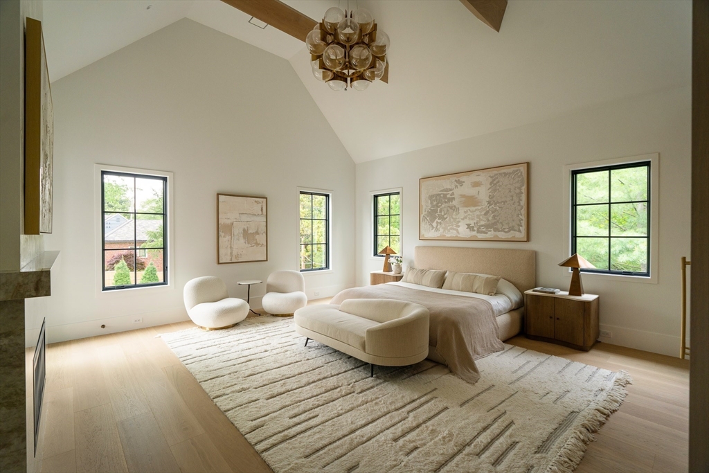 19 Bonnybrook Road Newton, MA 02468 - Photo 23 of 42 a spacious bedroom with a bed and wooden floor
